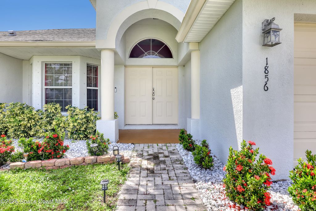 Photo of 1856 Fairlight Street NW, Palm Bay, FL 32907 (MLS # 1056955)