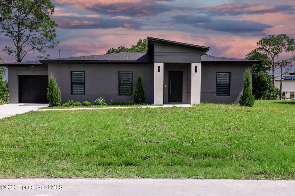 Photo of 743 Darby Avenue SW, Palm Bay, FL 32908 (MLS # 1058744)