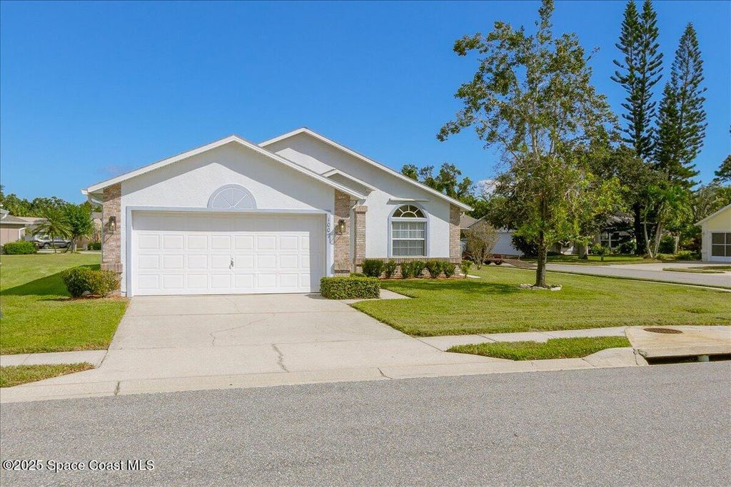 Photo of 1007 Pine Creek Circle NE, Palm Bay, FL 32905 (MLS # 1060231)