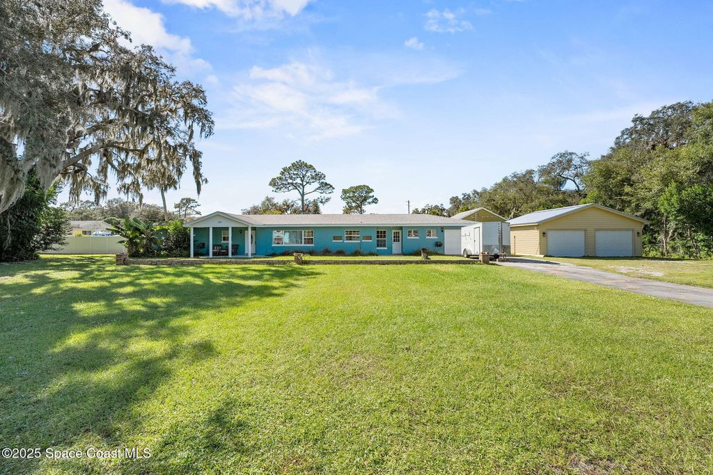 Photo of 106 S Mantor Avenue, Titusville, FL 32796 (MLS # 1060256)
