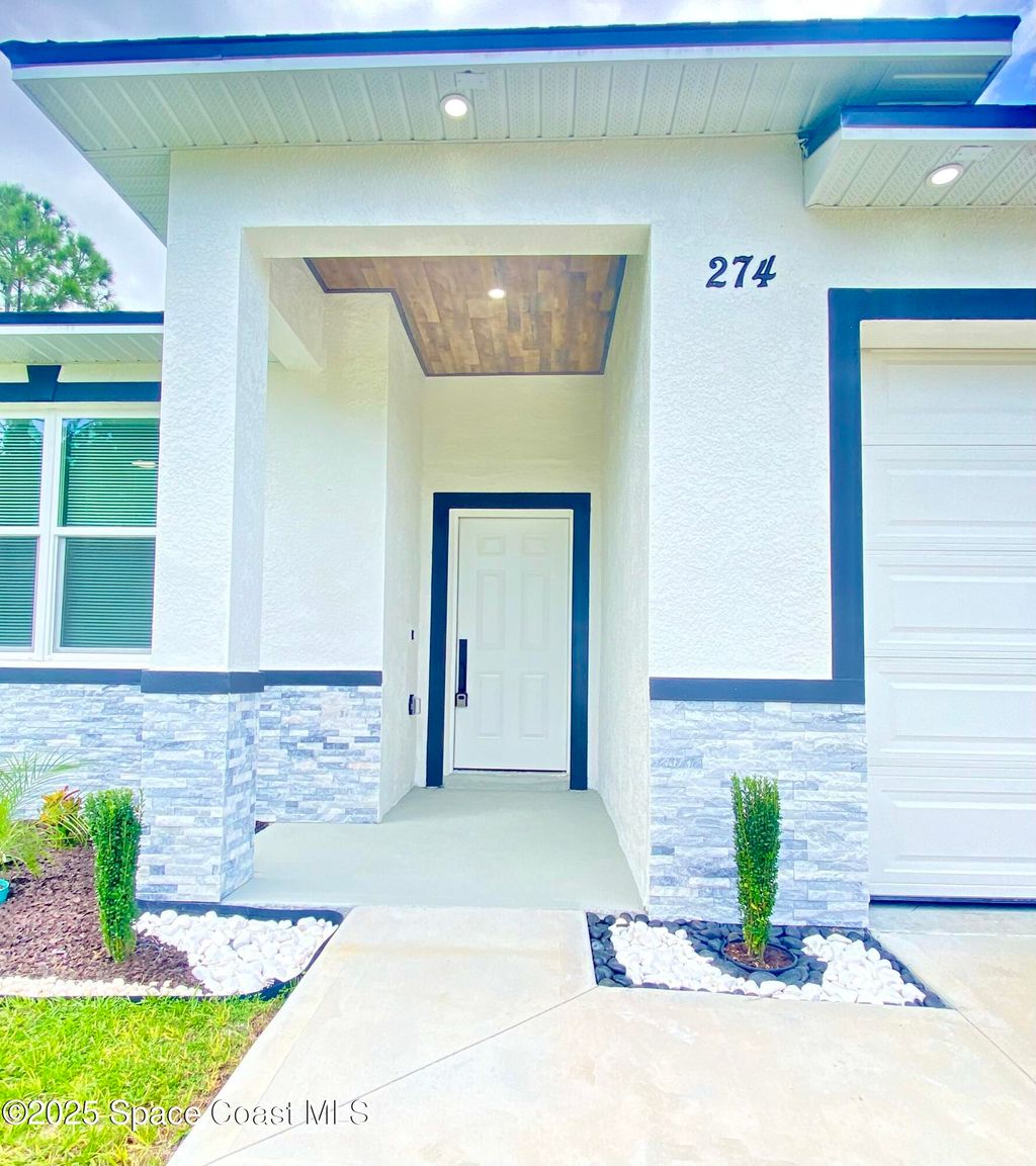 Photo of 274 Hoffer Avenue NW, Palm Bay, FL 32907 (MLS # 1058239)