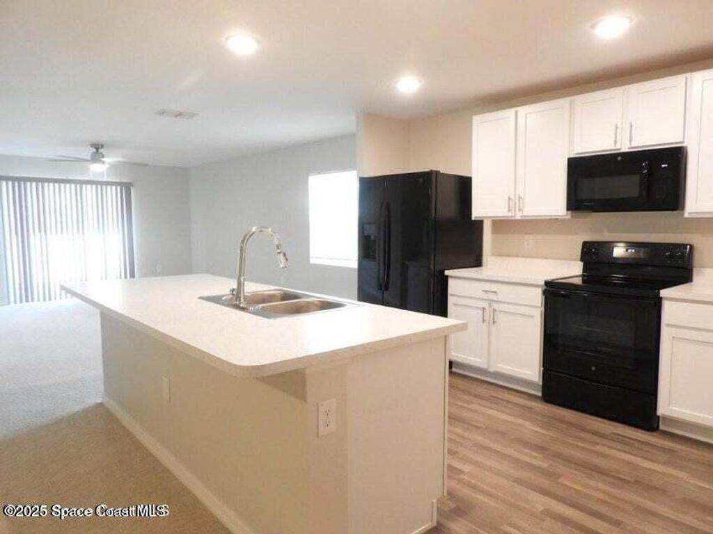Photo of 690 San Filippo Drive SE, Palm Bay, FL 32909 (MLS # 1057882)