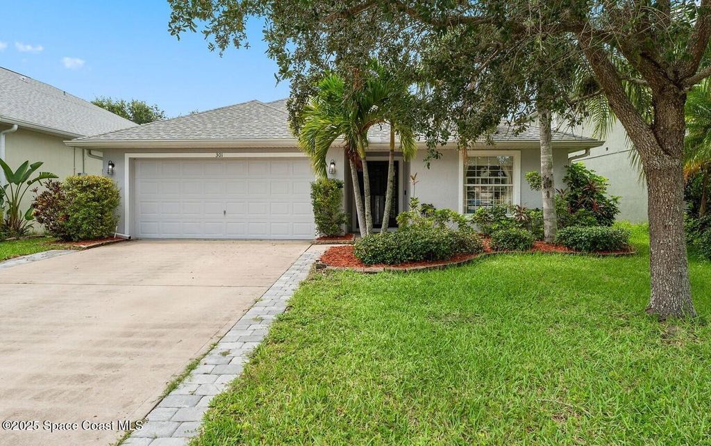 Photo of 301 Wishing Well Circle SW, Palm Bay, FL 32908 (MLS # 1055705)
