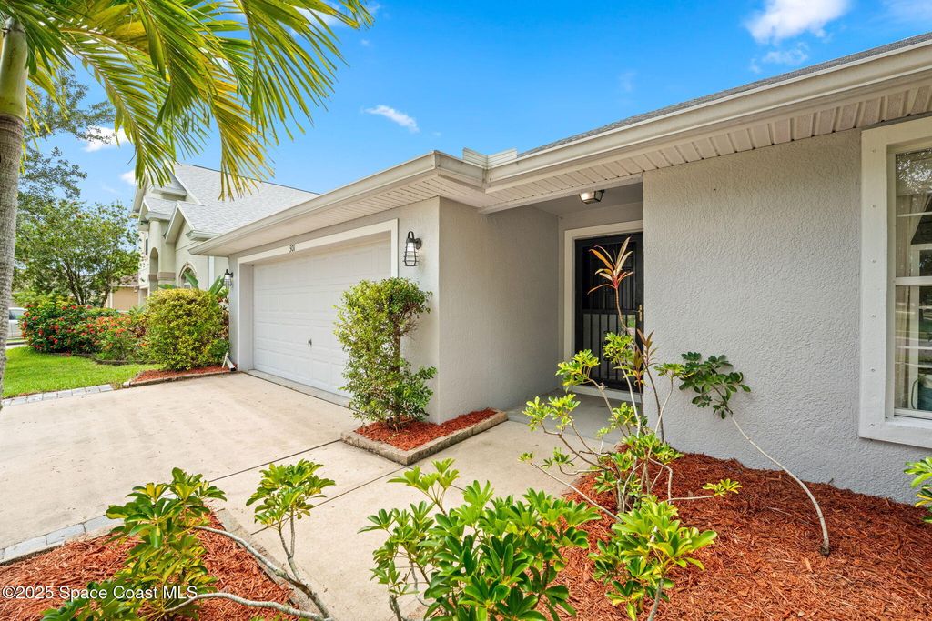 Photo of 301 Wishing Well Circle SW, Palm Bay, FL 32908 (MLS # 1055705)