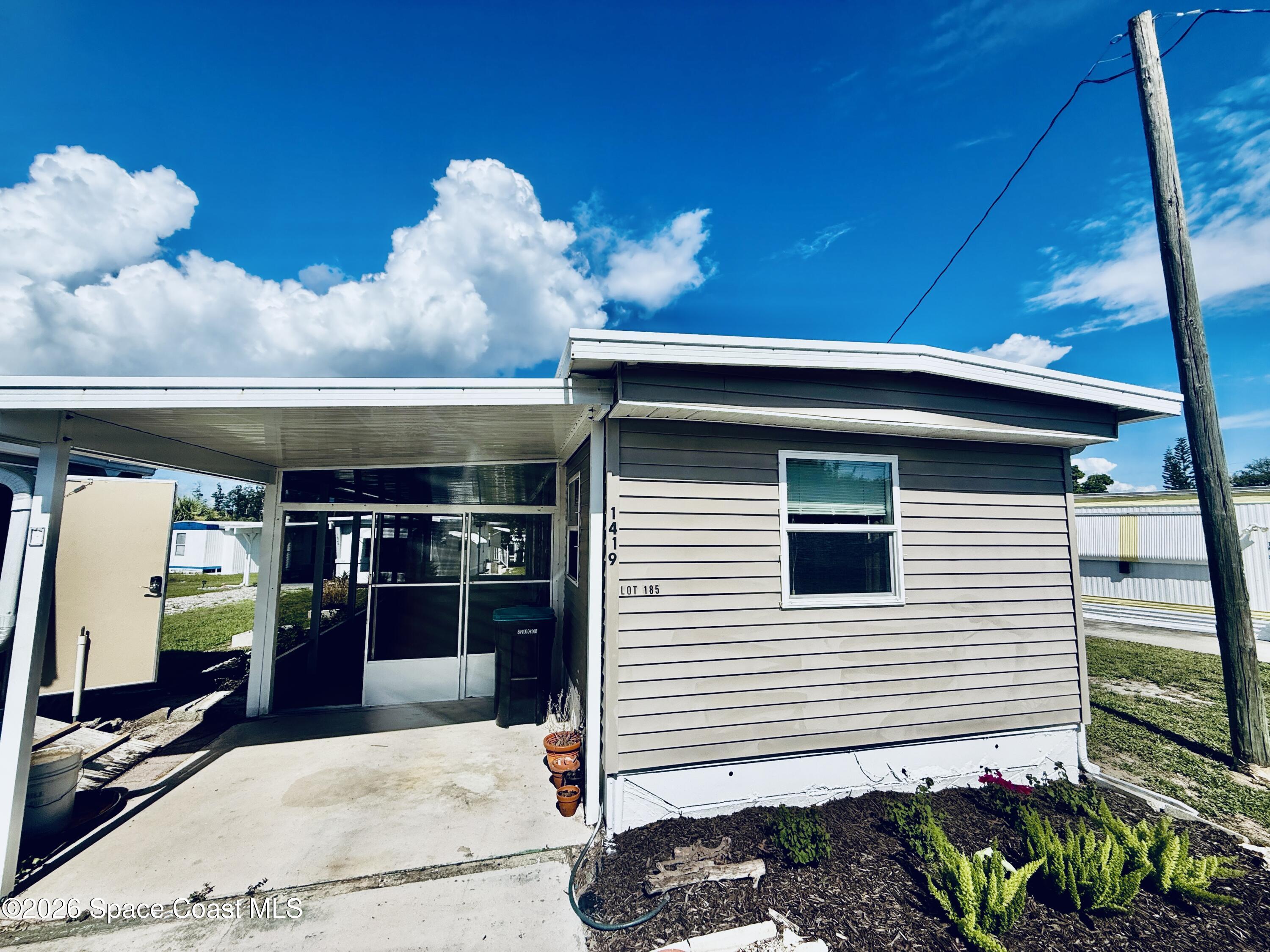 Photo 1 of 57 — 1419 Turkey Creek Drive NE, Palm Bay, FL 32905