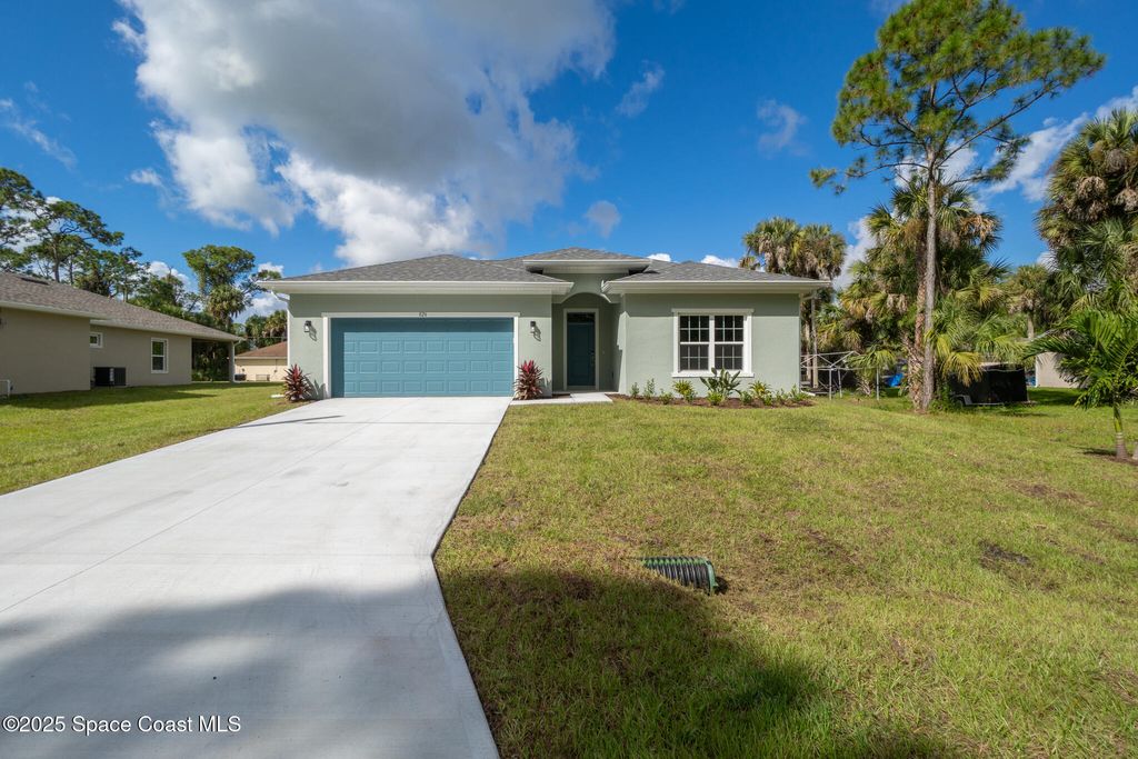 Photo of 826 Hartsdale Avenue SW, Palm Bay, FL 32908 (MLS # 1060275)