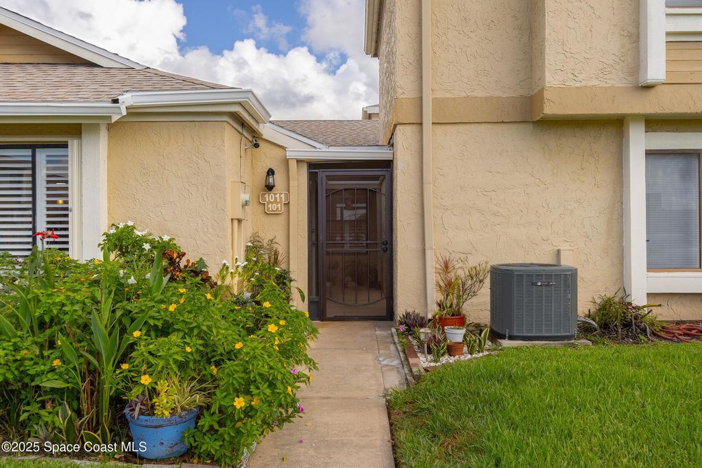 Photo of 1011 Abada Court NE #101, Palm Bay, FL 32905 (MLS # 1057865)