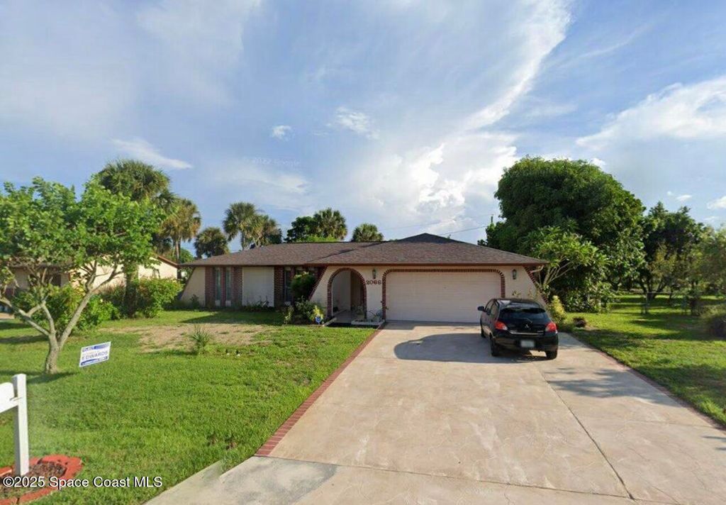 Photo of 2066 Acacia Street NE, Palm Bay, FL 32905 (MLS # 1058871)