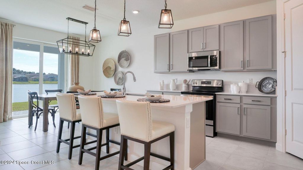 Photo of 2026 Fuchsia Place NW, Palm Bay, FL 32907 (MLS # 1058028)