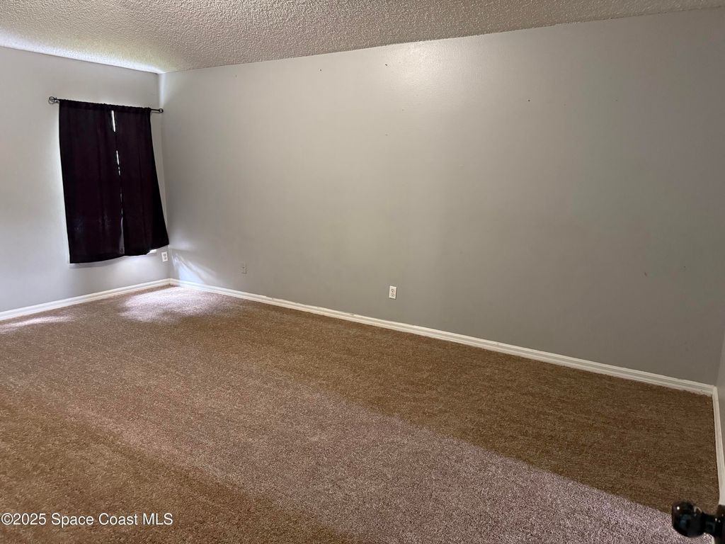 Photo of 457 Fitzsimmons Street, Palm Bay, FL 32908 (MLS # 1055849)