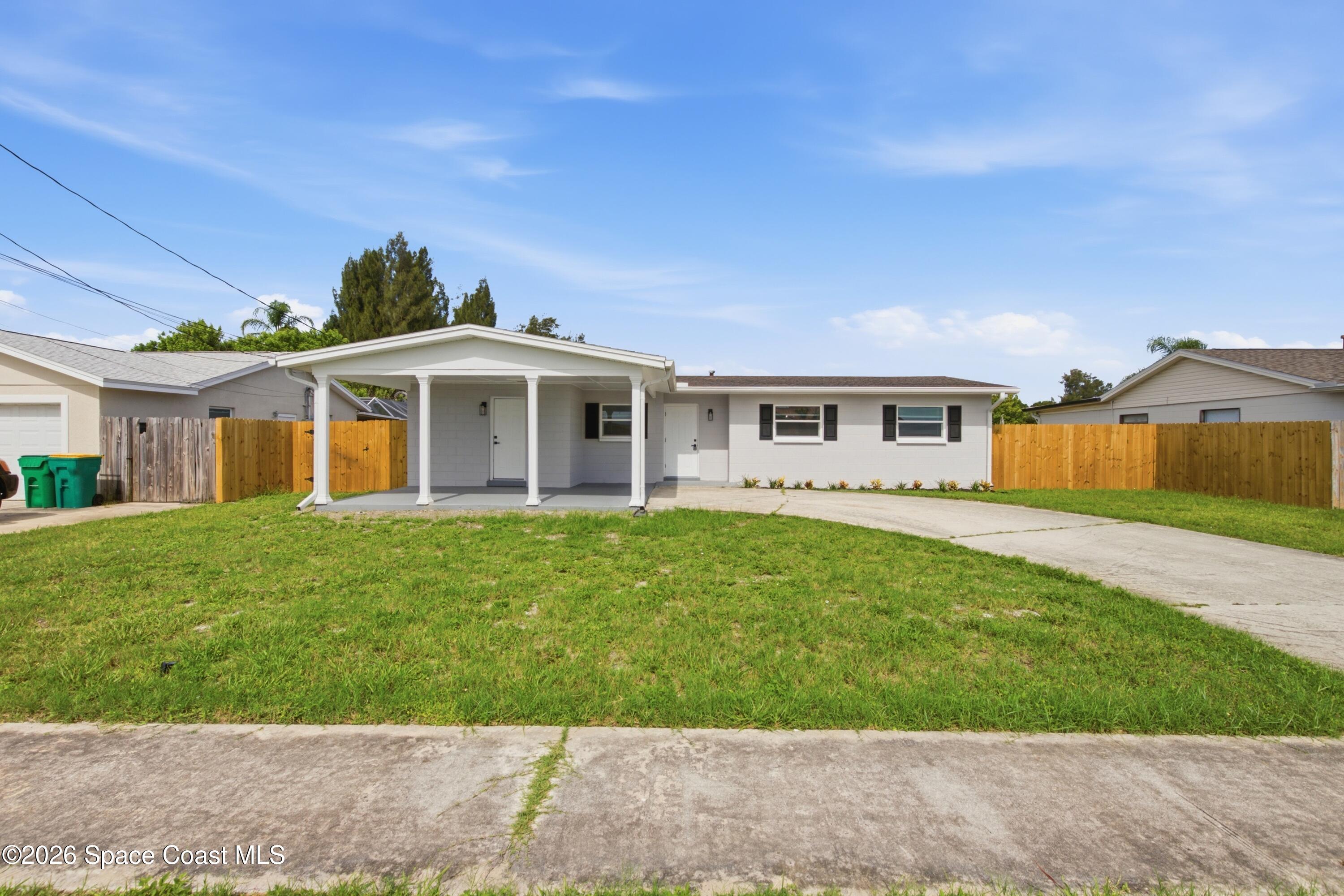 Photo 1 of 33 — 1085 Montego Bay Drive N, Merritt Island, FL 32953