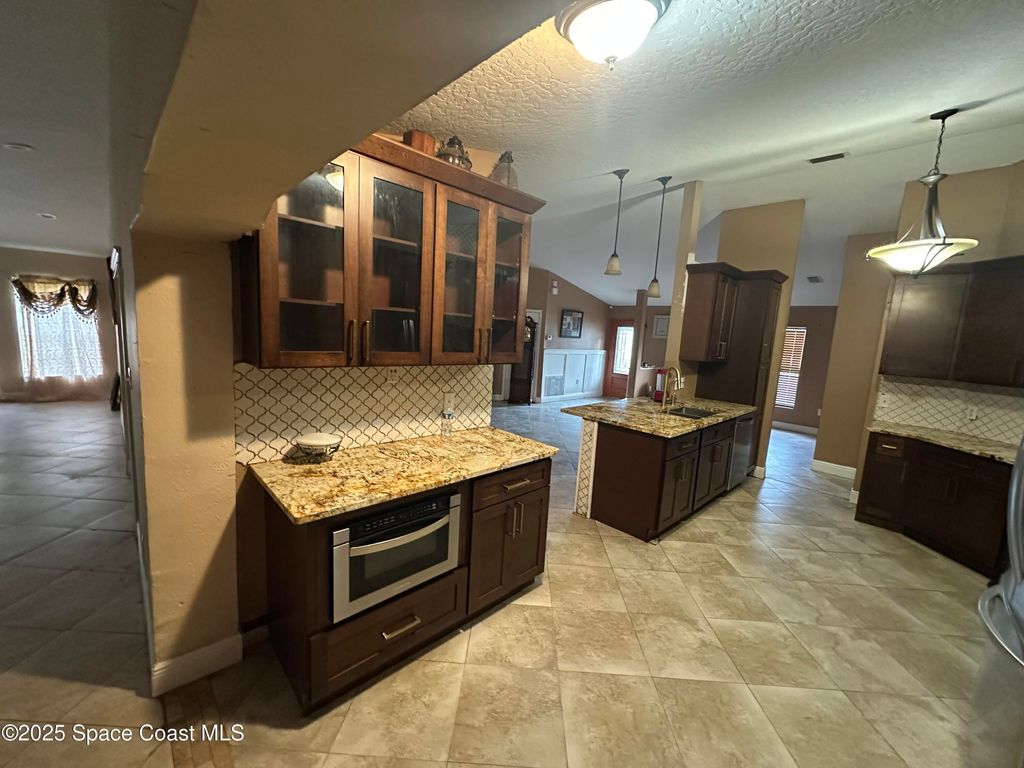 Photo of 688 White Cloud Street SW, Palm Bay, FL 32908 (MLS # 1057491)