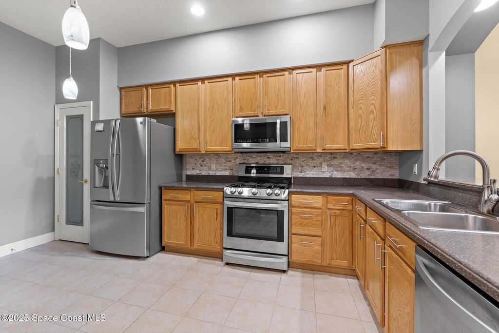 Photo of 104 Joe Place, Cape Canaveral, FL 32920 (MLS # 1060227)