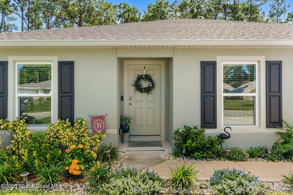 Photo of 1324 Gibraltor Street SW, Palm Bay, FL 32909 (MLS # 1058221)