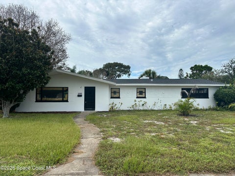 Photo of 230 Micanopy Court, Indian Harbour Beach, FL 32937 (MLS # 1084502)