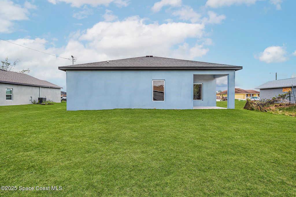 Photo of 418 Haleybury Street SW, Palm Bay, FL 32908 (MLS # 1056841)