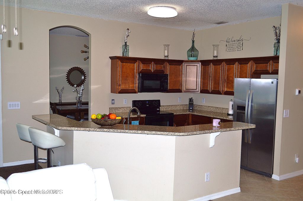 Photo of 507 Haleybury Street SW, Palm Bay, FL 32908 (MLS # 1057116)
