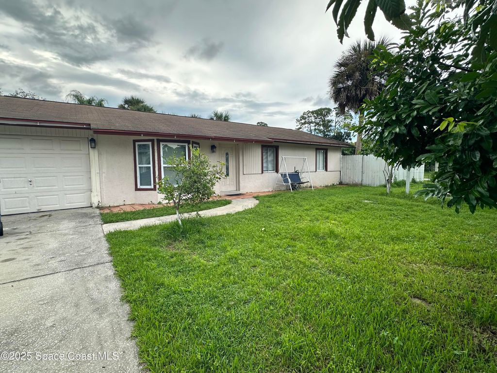 Photo of 849 Americana Boulevard NE, Palm Bay, FL 32907 (MLS # 1056743)
