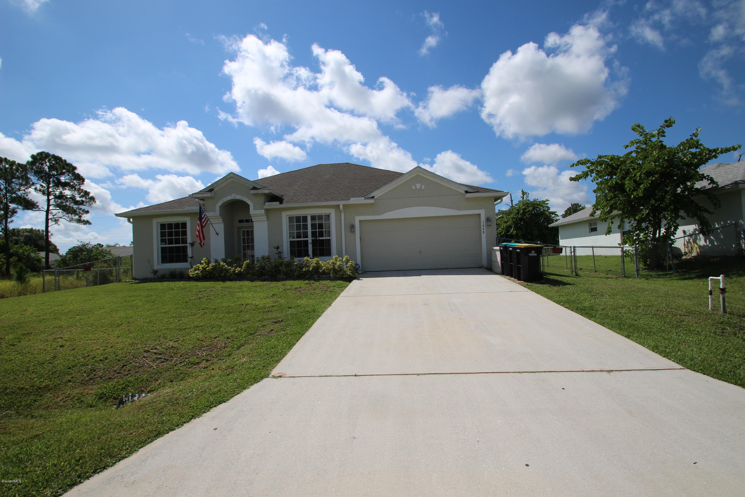 Photo 1 of 4 — 1048 SE Westport Street, Palm Bay, FL 32909