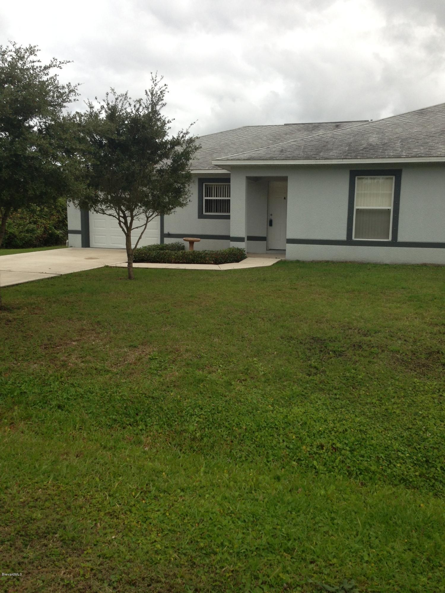 Photo 1 of 9 — 1650 SE Chamorro Street A, Palm Bay, FL 32909