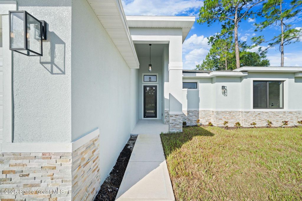 Photo of 1724 Tharp Road SE, Palm Bay, FL 32909 (MLS # 1058722)