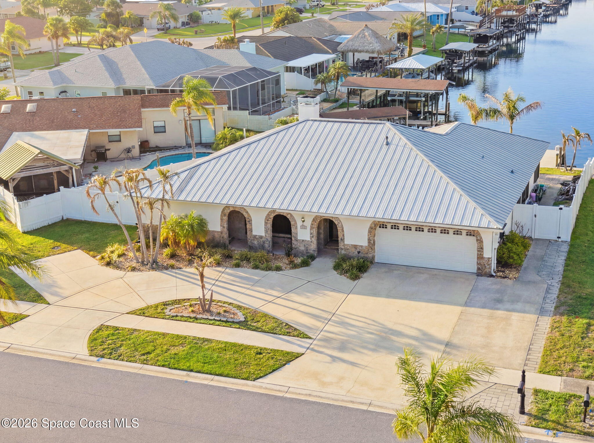 Photo 1 of 66 — 1525 Sykes Creek Drive, Merritt Island, FL 32953