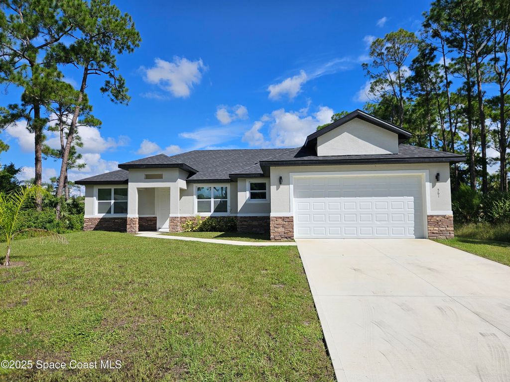 Photo of 561 Harrisburg Street SW, Palm Bay, FL 32908 (MLS # 1057743)