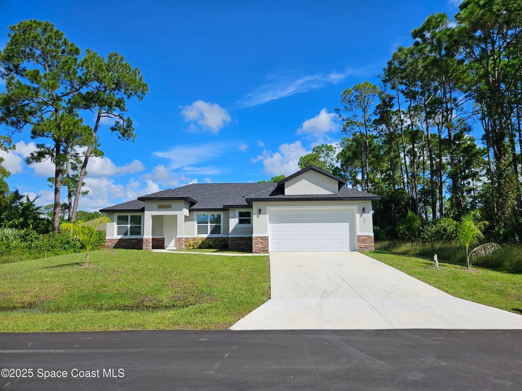 Photo of 561 Harrisburg Street SW, Palm Bay, FL 32908 (MLS # 1057743)