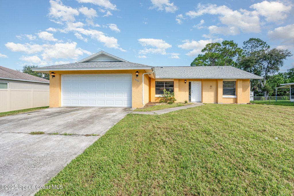 Photo of 1867 Cyclone Street NW, Palm Bay, FL 32907 (MLS # 1058267)