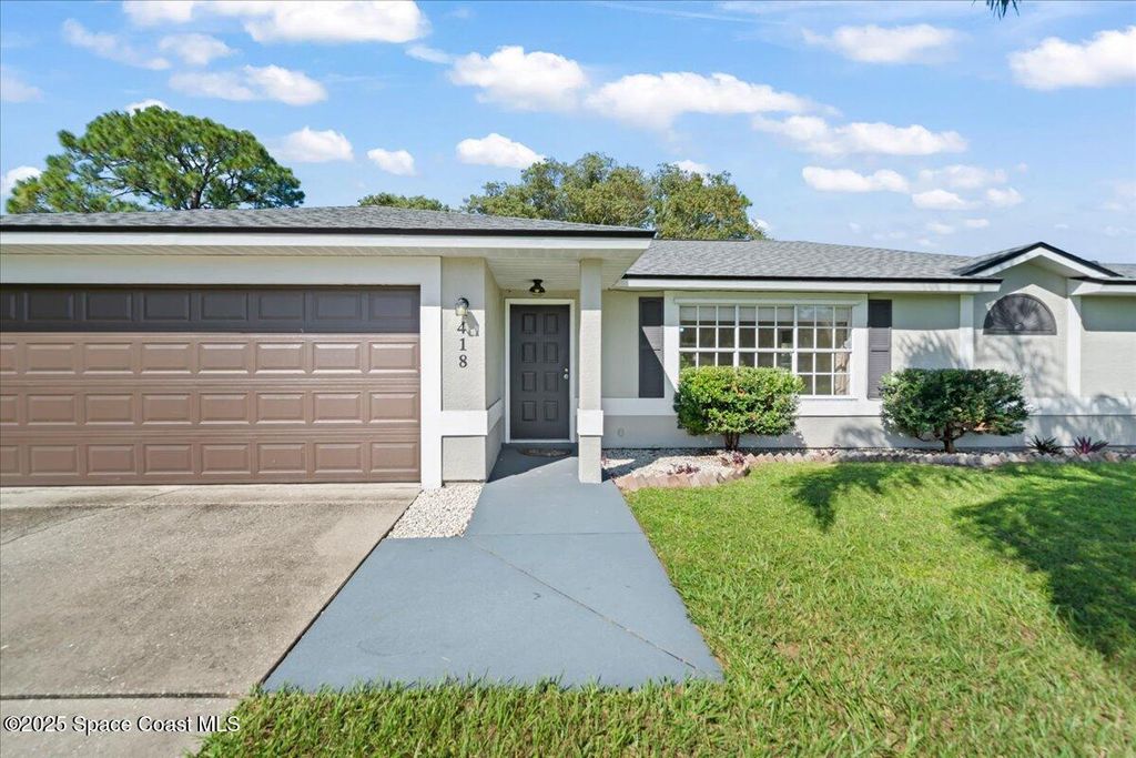 Photo of 418 Empire Avenue NE, Palm Bay, FL 32907 (MLS # 1058176)