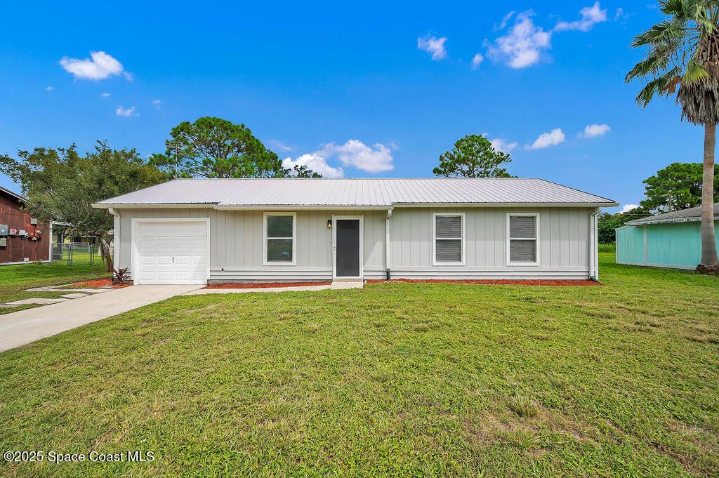 Photo of 271 Cocoa Street SE, Palm Bay, FL 32909 (MLS # 1056531)