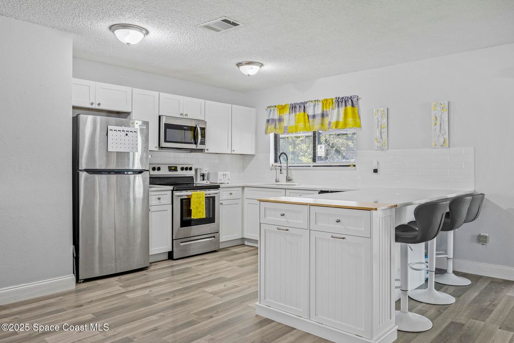 Photo of 797 Tooley Road SW, Palm Bay, FL 32908 (MLS # 1059172)