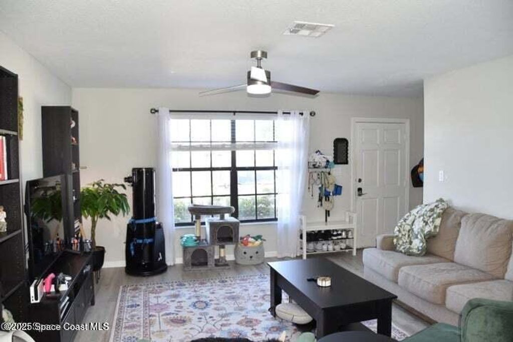 Photo of 1300 Arlington Lane NE #106, Palm Bay, FL 32905 (MLS # 1056506)