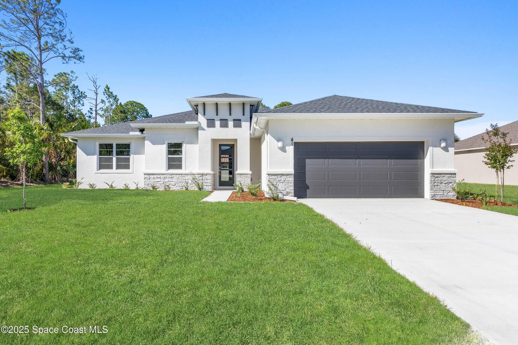 Photo of 570 Town Road SW, Palm Bay, FL 32908 (MLS # 1057234)