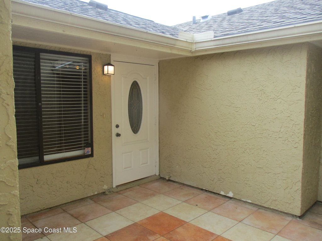 Photo of 1480 Sheafe Avenue NE #103, Palm Bay, FL 32905 (MLS # 1060163)