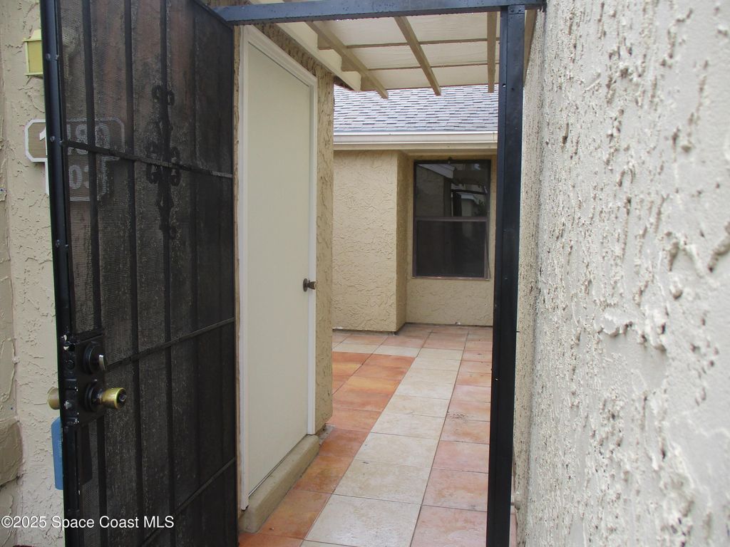 Photo of 1480 Sheafe Avenue NE #103, Palm Bay, FL 32905 (MLS # 1060163)