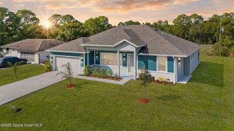 Photo of 1027 Wyoming Drive SE, Palm Bay, FL 32909 (MLS # 1063866)