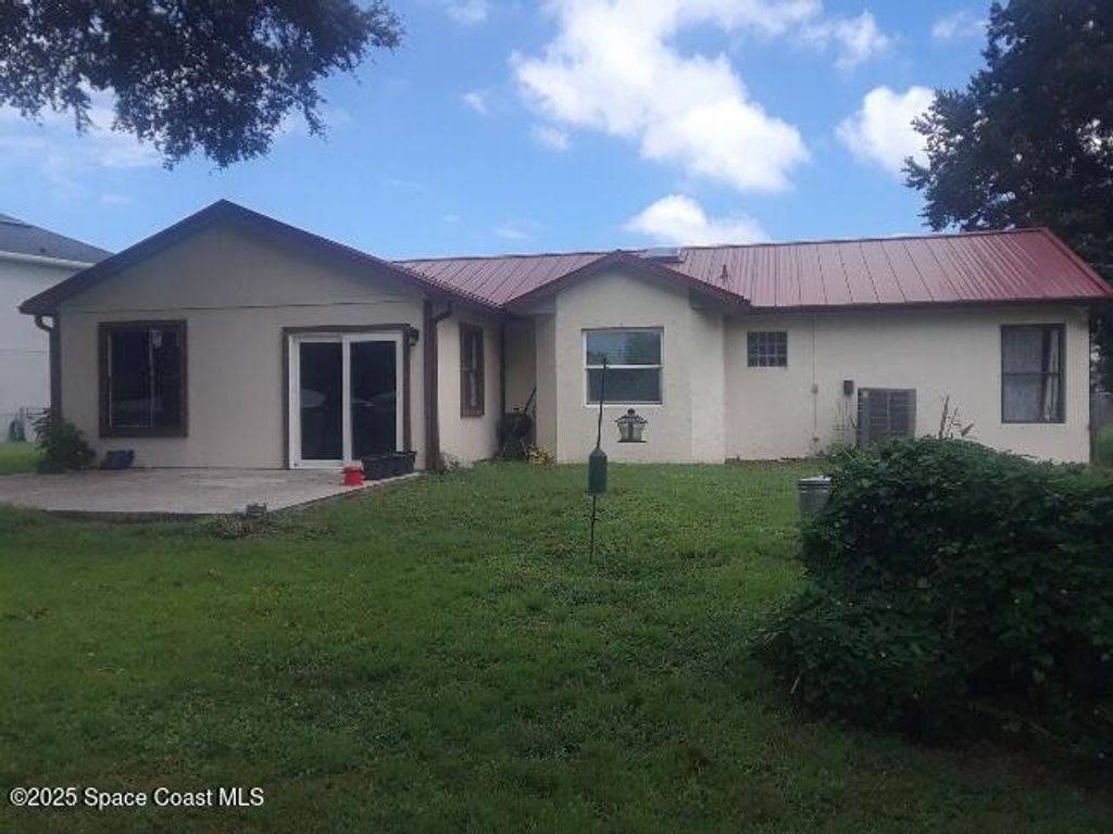 Photo of 282 Velvet Avenue NE, Palm Bay, FL 32907 (MLS # 1057913)