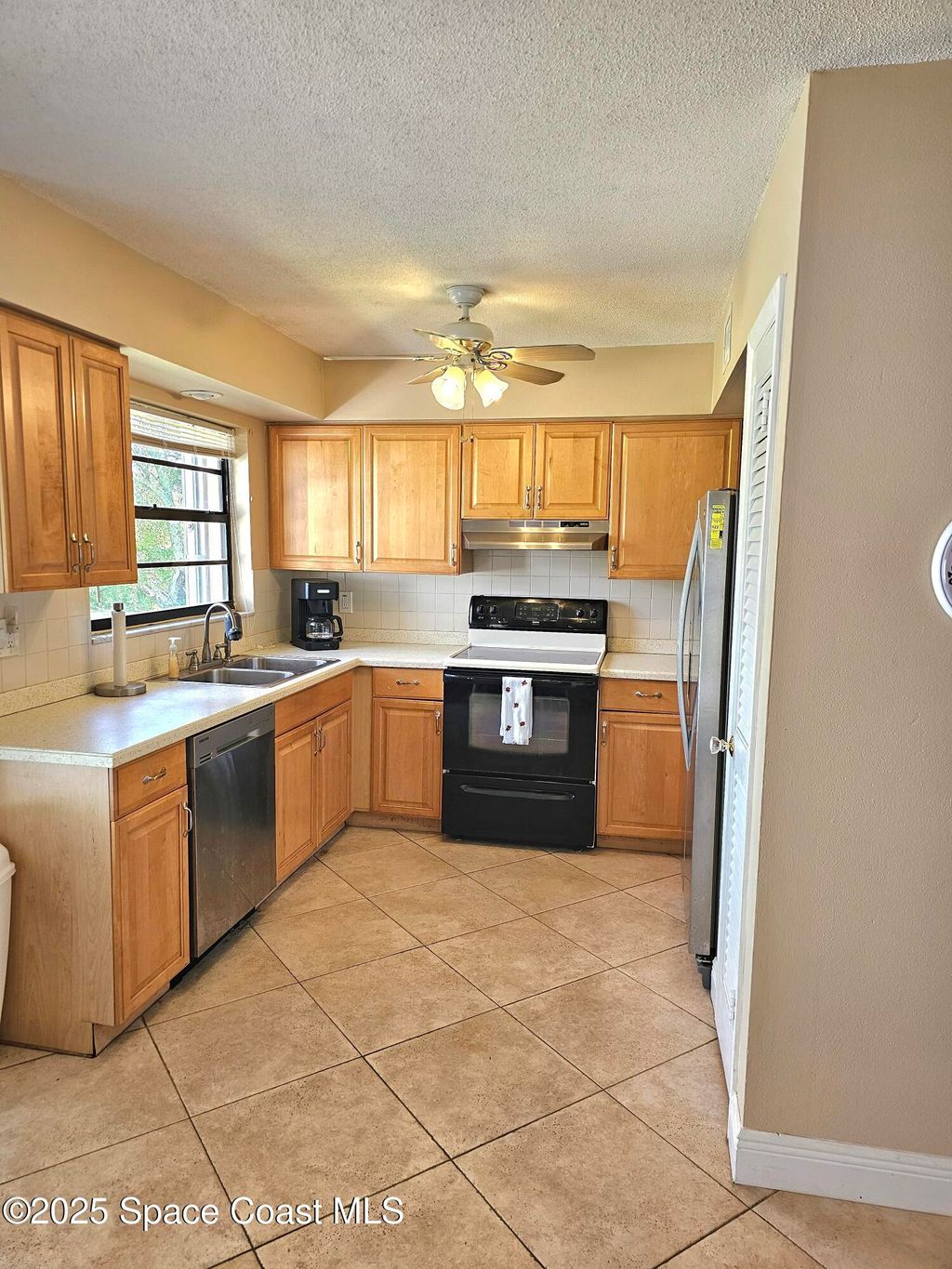 Photo of 898 Hampton Drive NE, Palm Bay, FL 32905 (MLS # 1057250)
