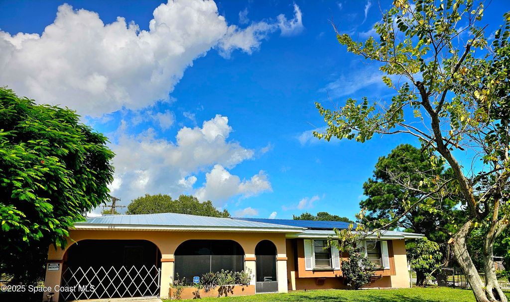 Photo of 898 Hampton Drive NE, Palm Bay, FL 32905 (MLS # 1057250)