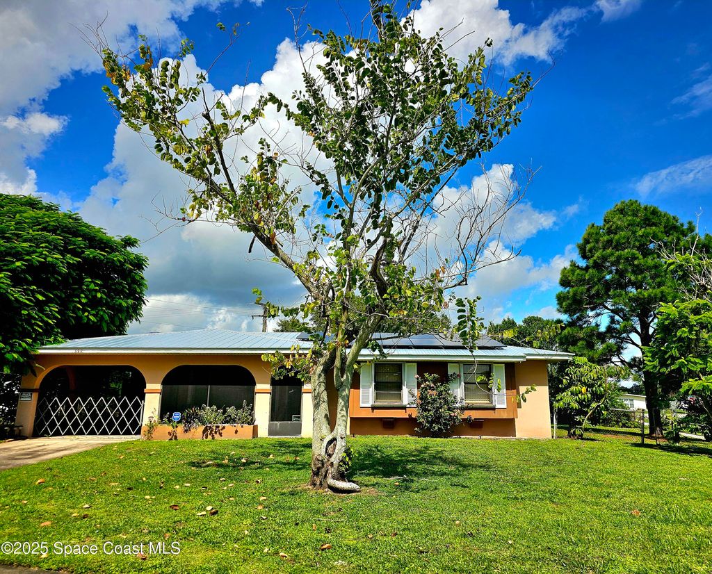 Photo of 898 Hampton Drive NE, Palm Bay, FL 32905 (MLS # 1057250)