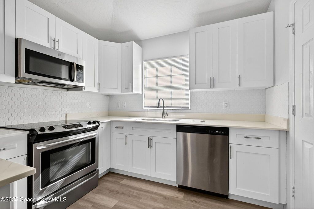 Photo of 1283 Goldenrod Circle NE, Palm Bay, FL 32905 (MLS # 1056103)