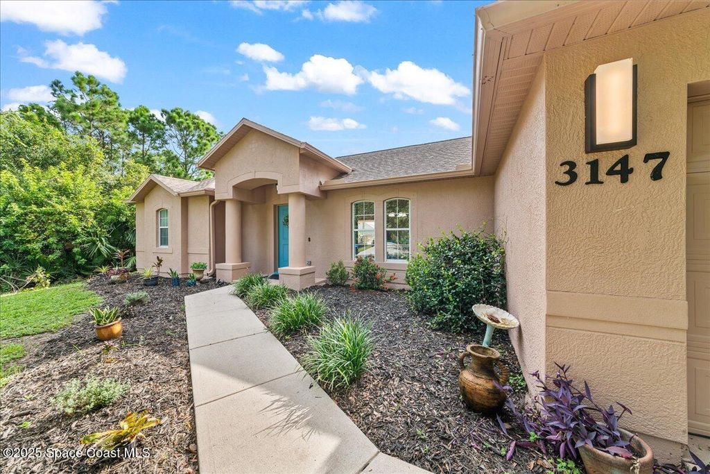 Photo of 3147 Winchester Avenue, Palm Bay, FL 32909 (MLS # 1056481)