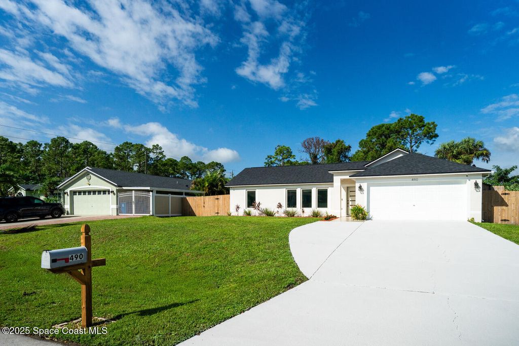 Photo of 490 Tillman Avenue SW, Palm Bay, FL 32908 (MLS # 1058873)