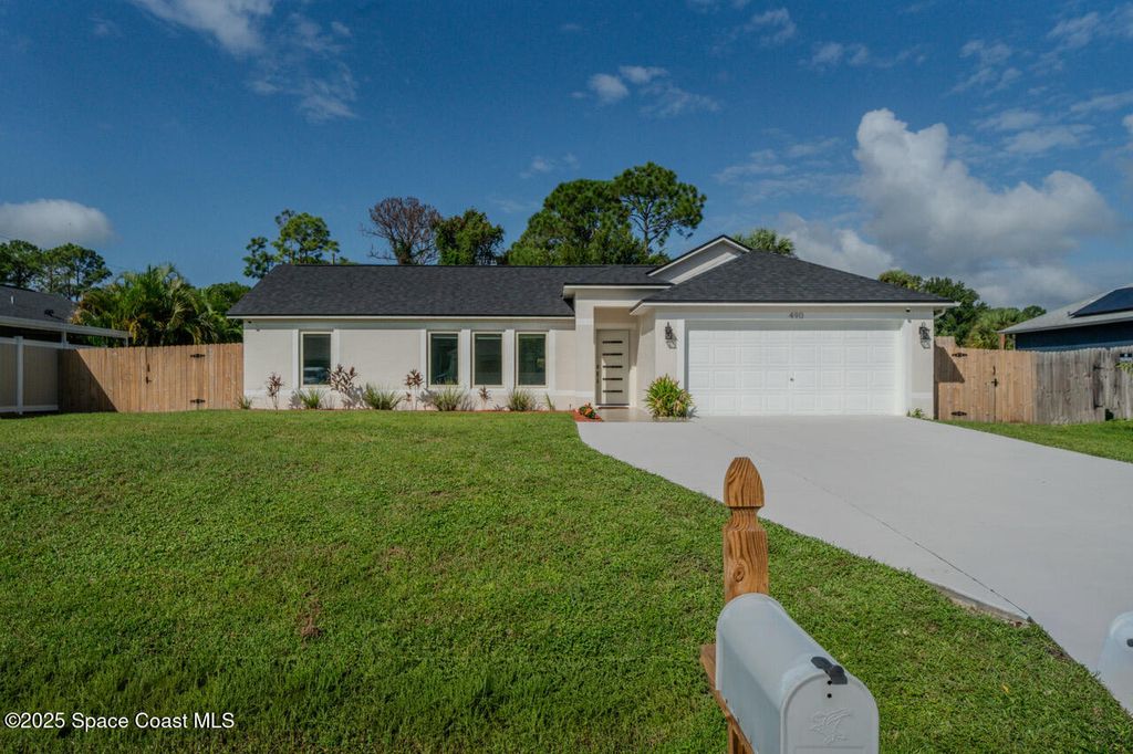 Photo of 490 Tillman Avenue SW, Palm Bay, FL 32908 (MLS # 1058873)