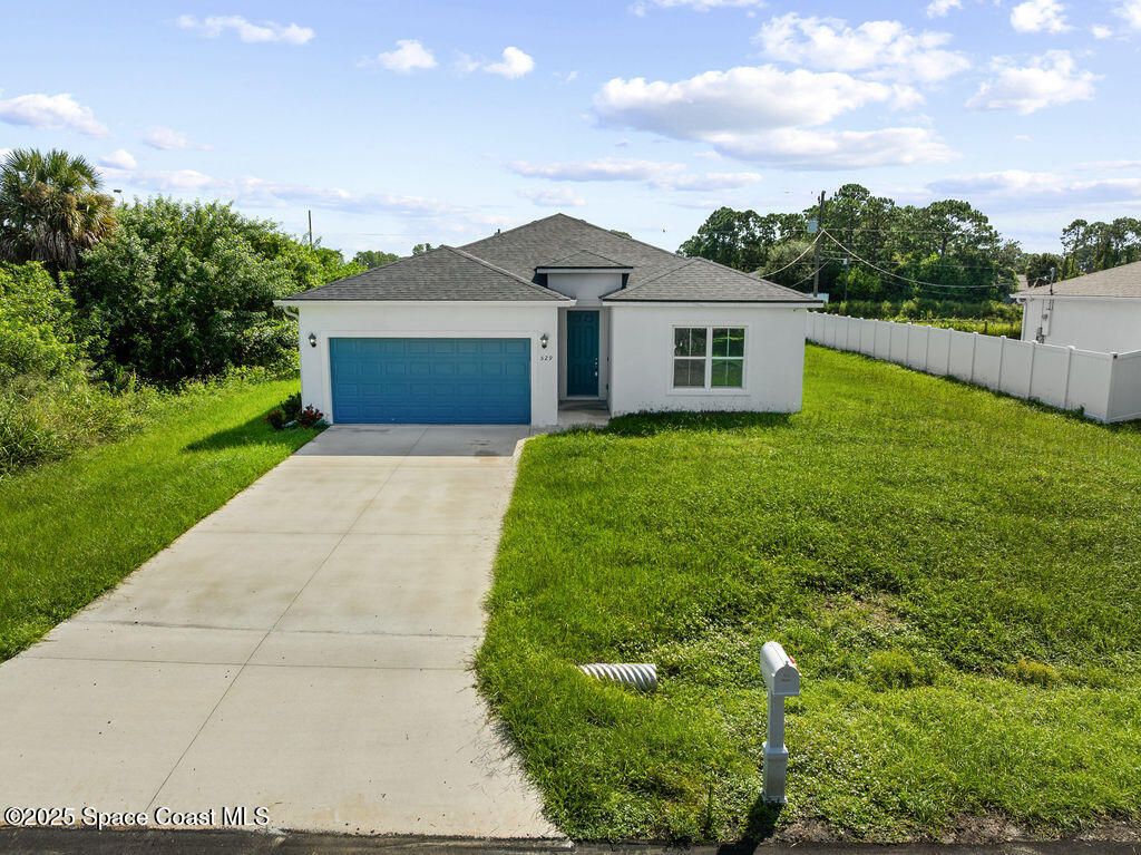 Photo of 529 Tejon Avenue SW, Palm Bay, FL 32908 (MLS # 1057668)