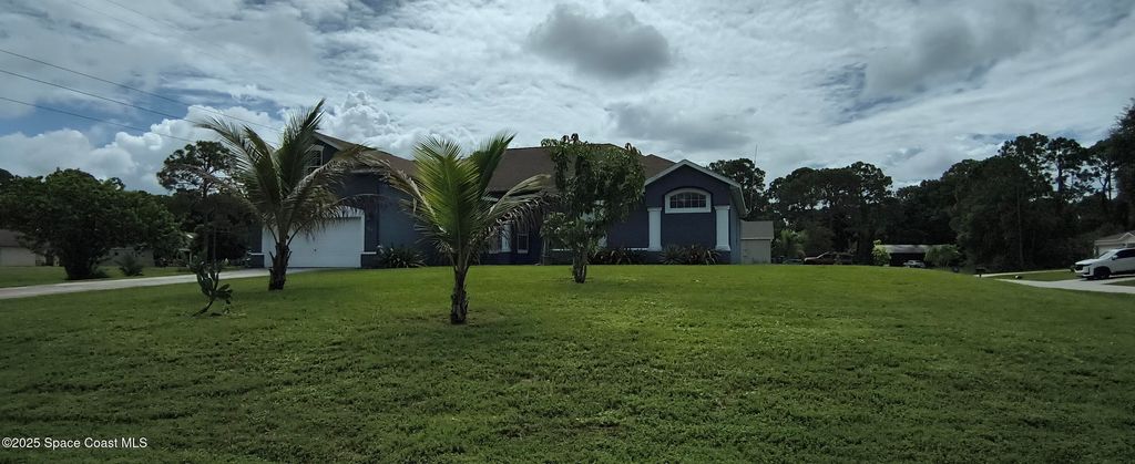 Photo of 966 San Rafael Road SW, Palm Bay, FL 32908 (MLS # 1056132)