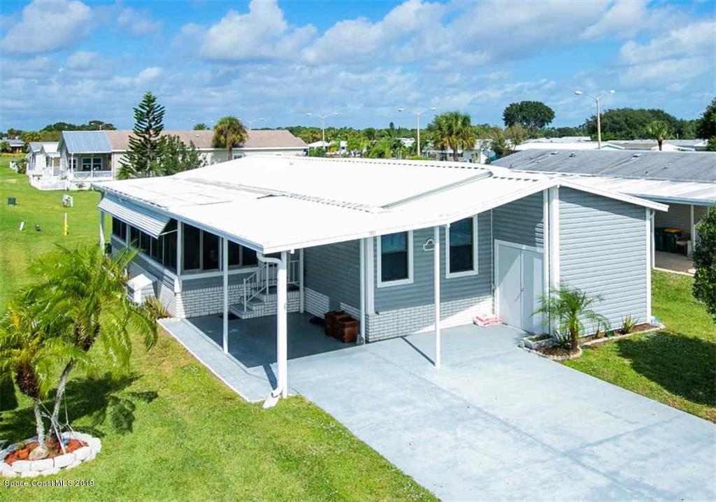Photo 1 of 18 — 1002 Barefoot Circle, Barefoot Bay, FL 32976