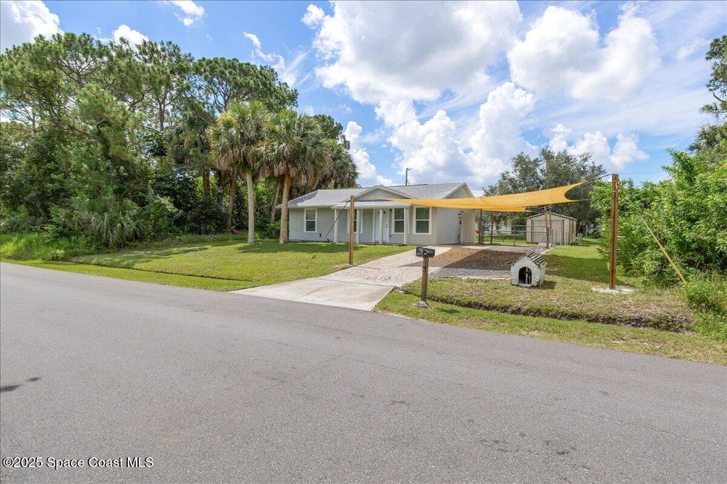 Photo of 1076 Ivanhoe Street NW, Palm Bay, FL 32907 (MLS # 1056263)