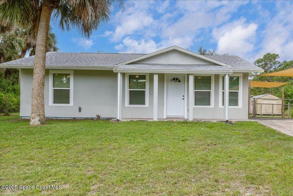 Photo of 1076 Ivanhoe Street NW, Palm Bay, FL 32907 (MLS # 1056263)